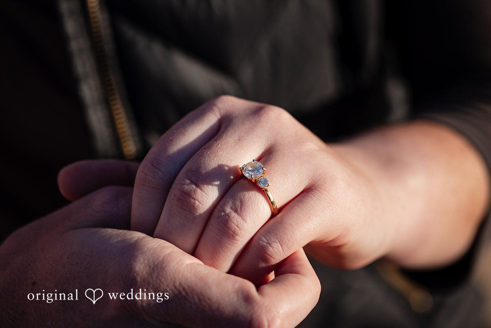 A close-up shot of the bride's engagement ring