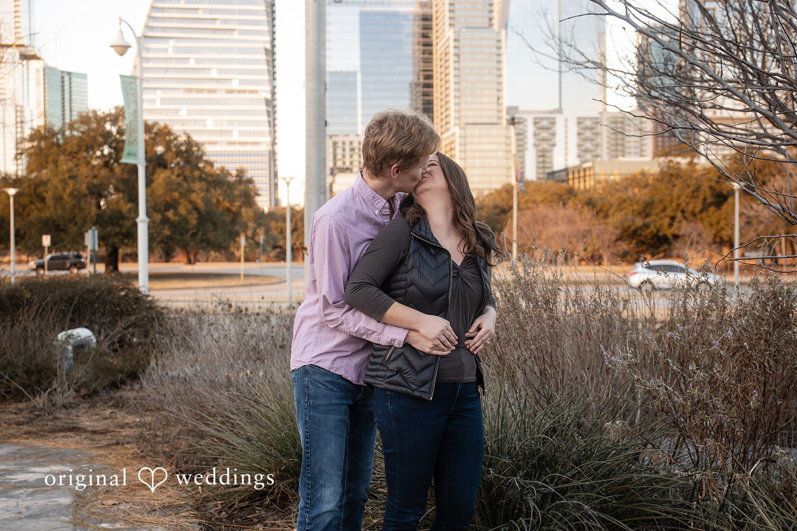 The couple shares a romantic kiss