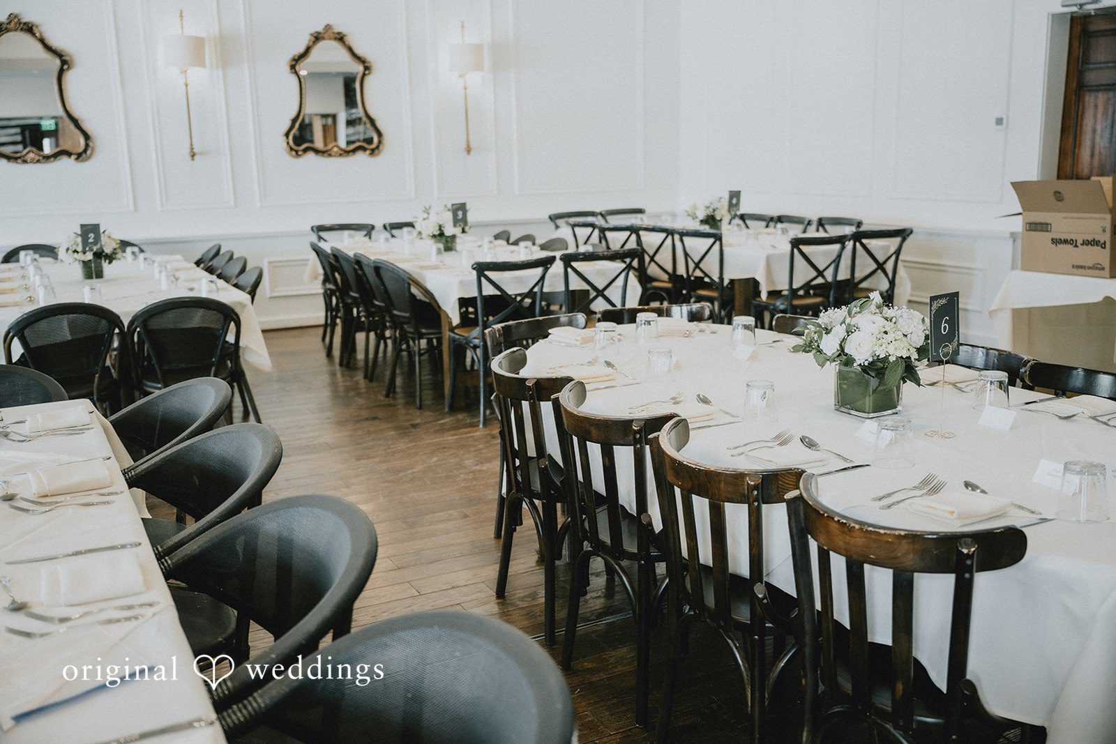 Close-up of dining table arrangement with chairs at Cedar Knoll