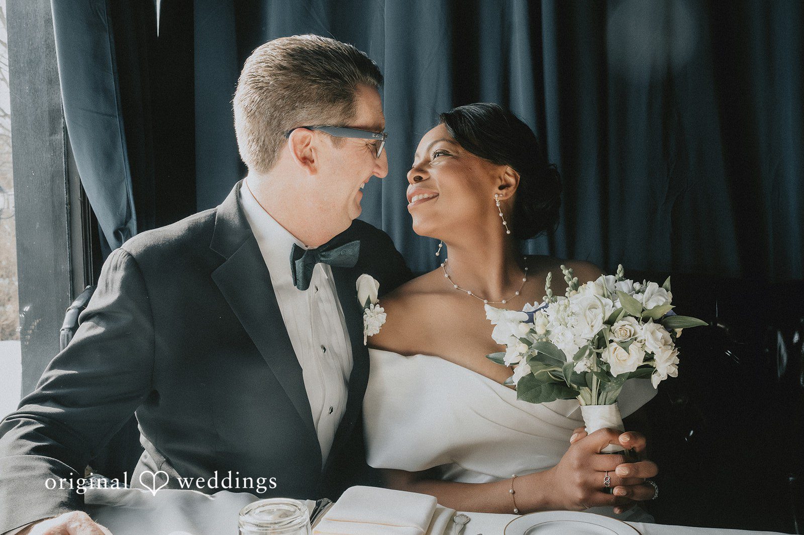 Close-up of couple smiling at each other at Cedar Knoll