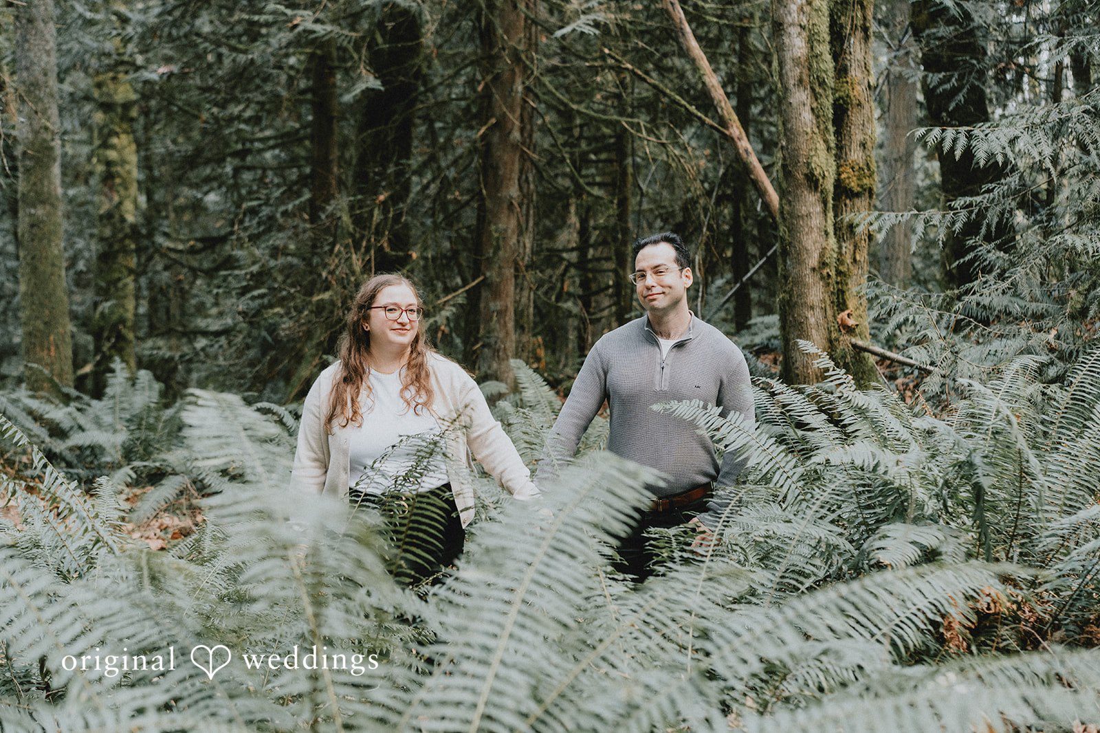 Happy couple standing together with a calm and candid feel.