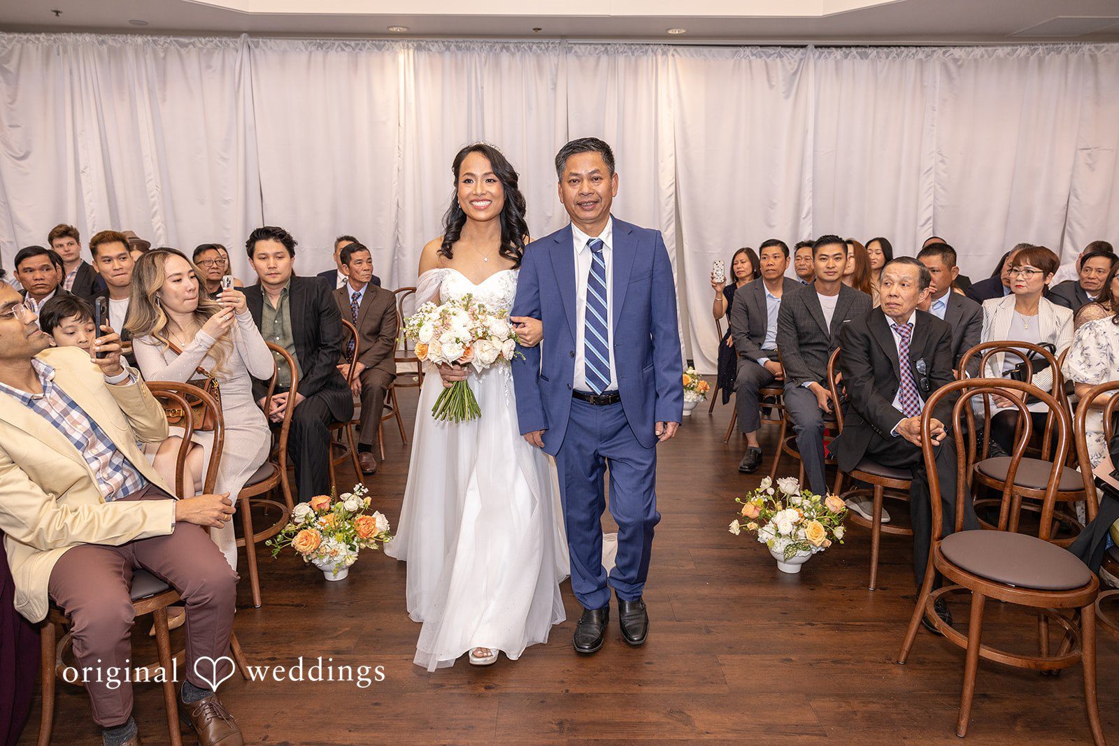 Our Seattle wedding photographer captured the moment bride's father walked the bride down the aisle