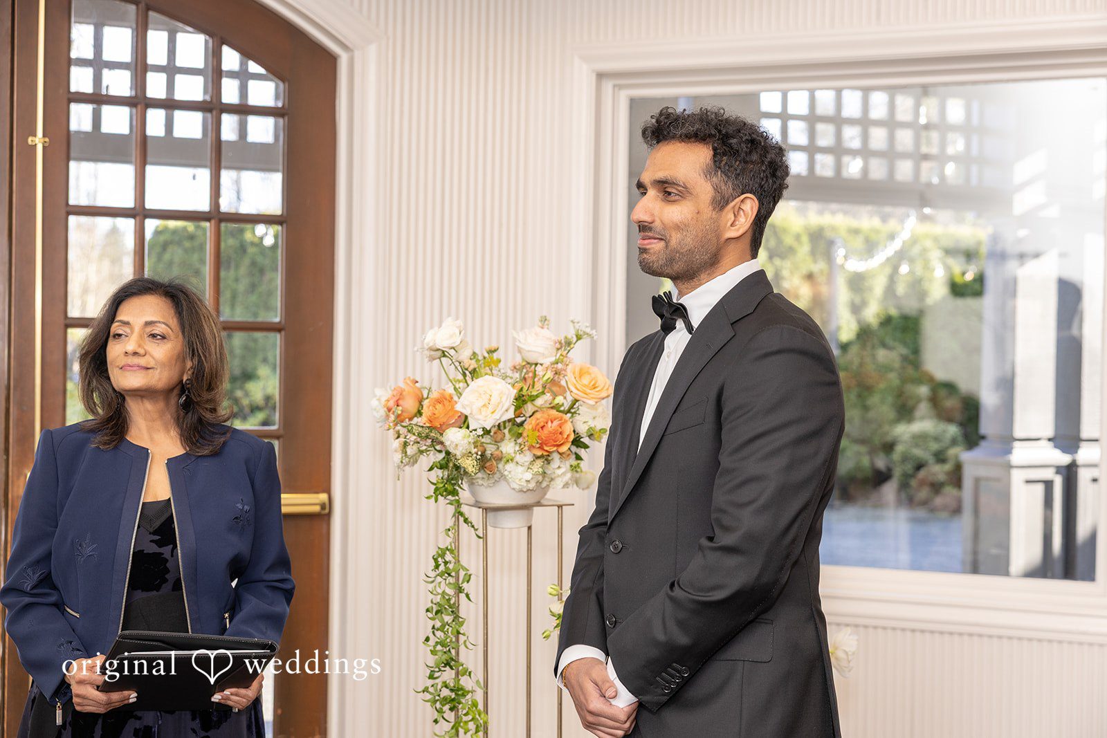 The groom all emotional as the bride reads her vows
