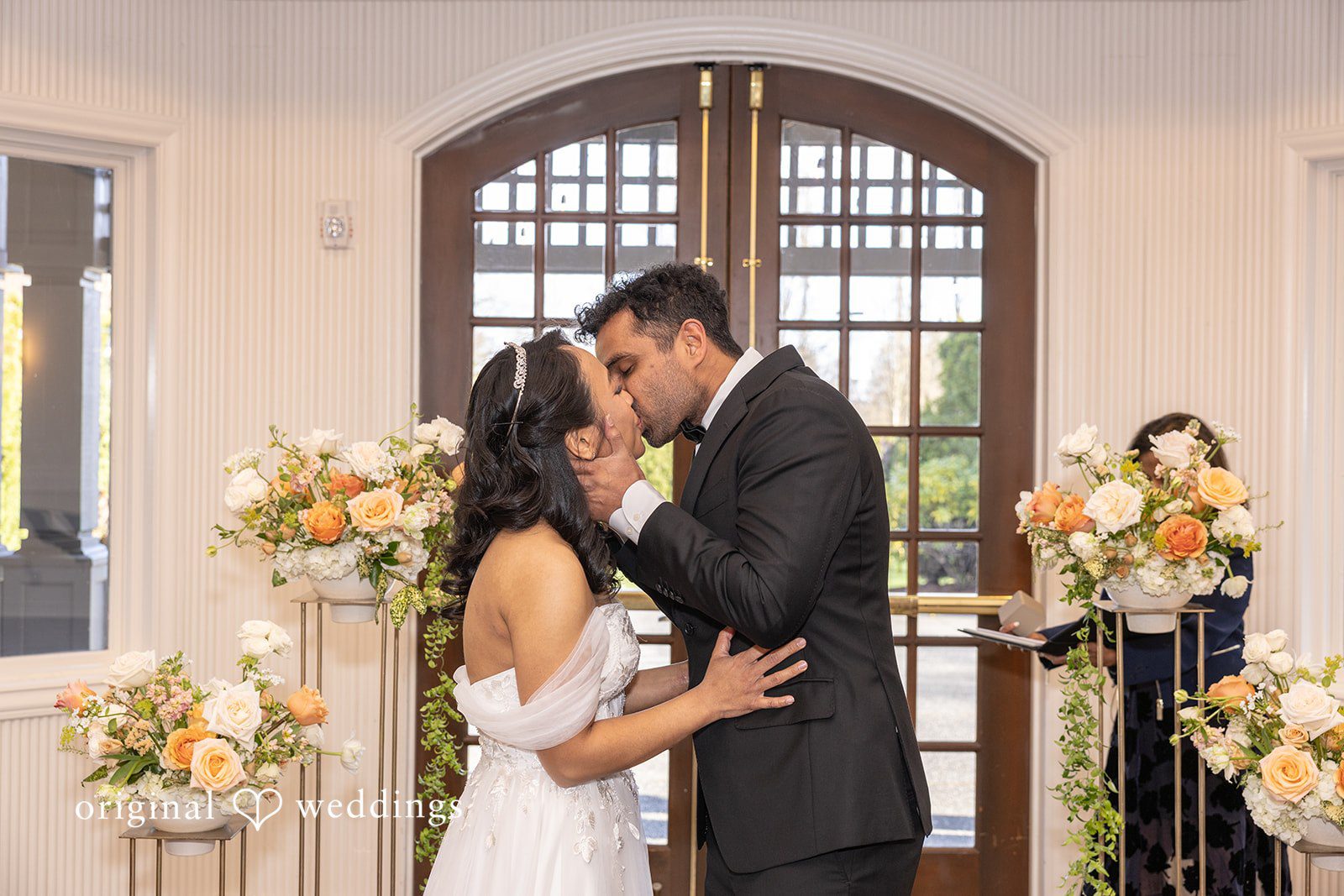 The couple shares their first kiss
