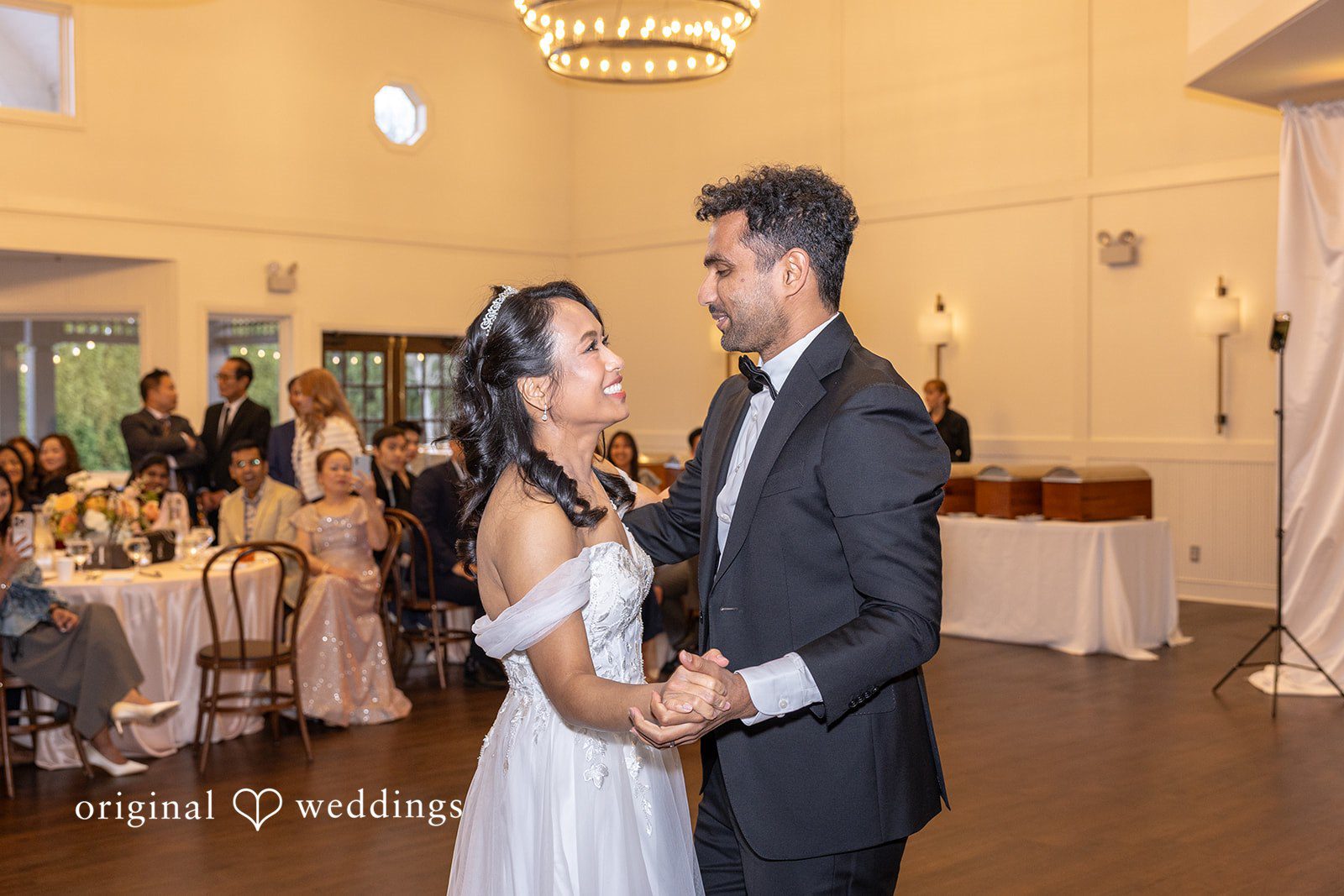 The couple takes their first dance