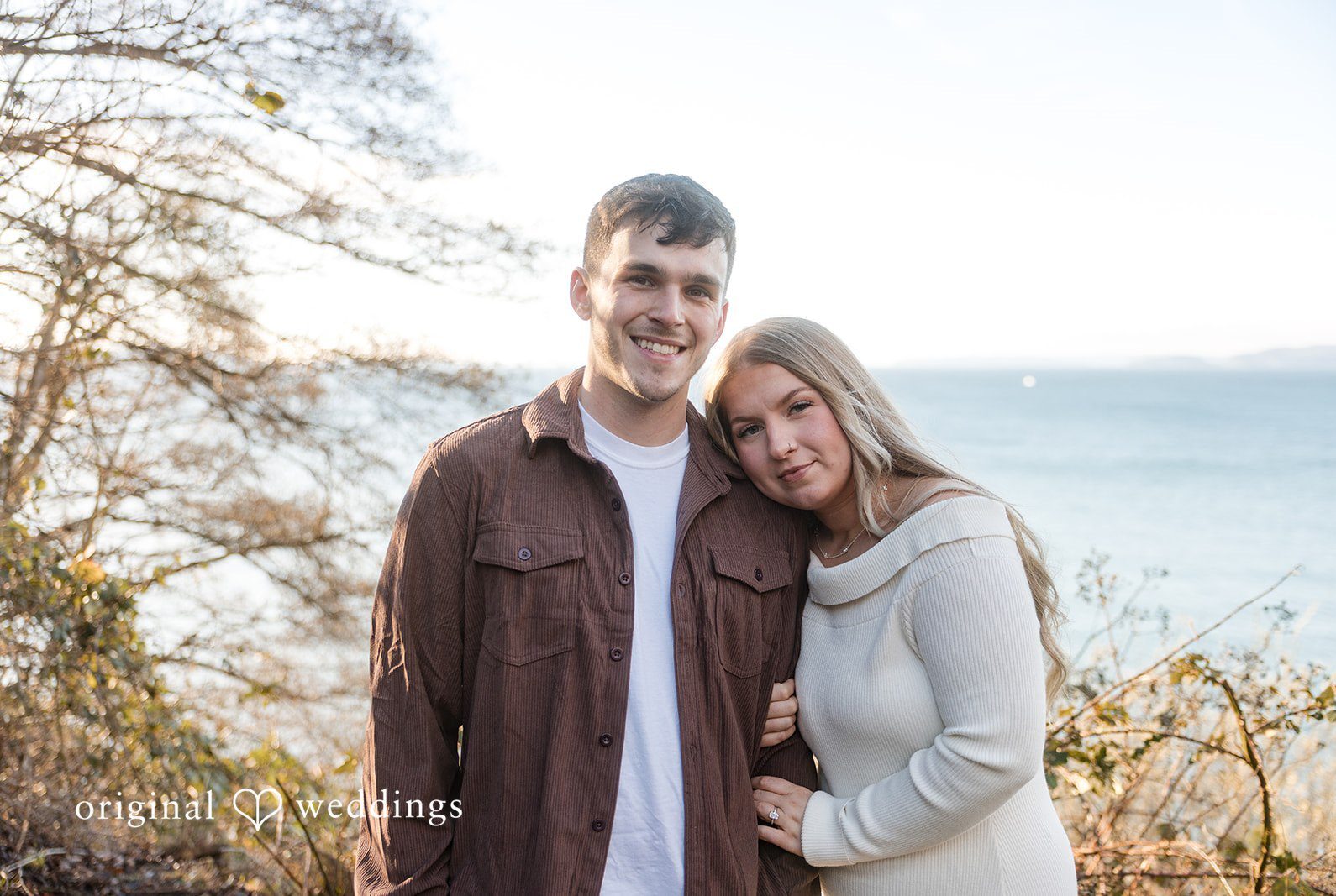 Engagement photography services by original weddings capturing lovely moments of couple at Discovery Park