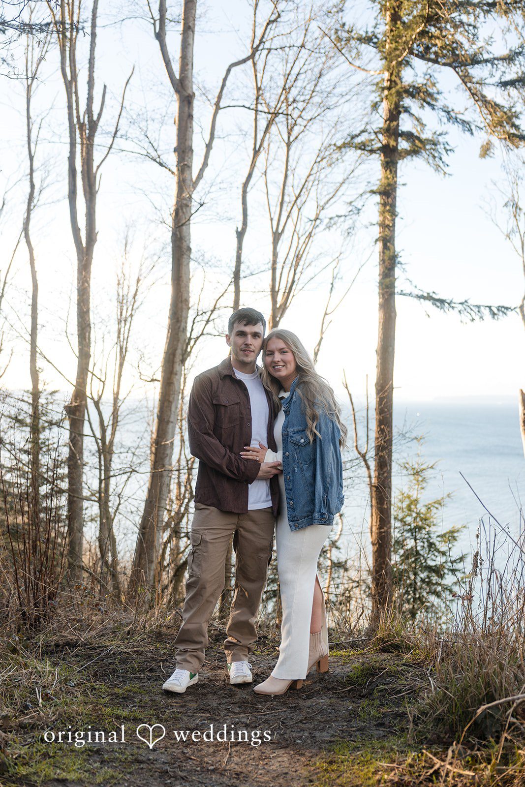 Candid couple interaction during engagement photography session at Discovery Park