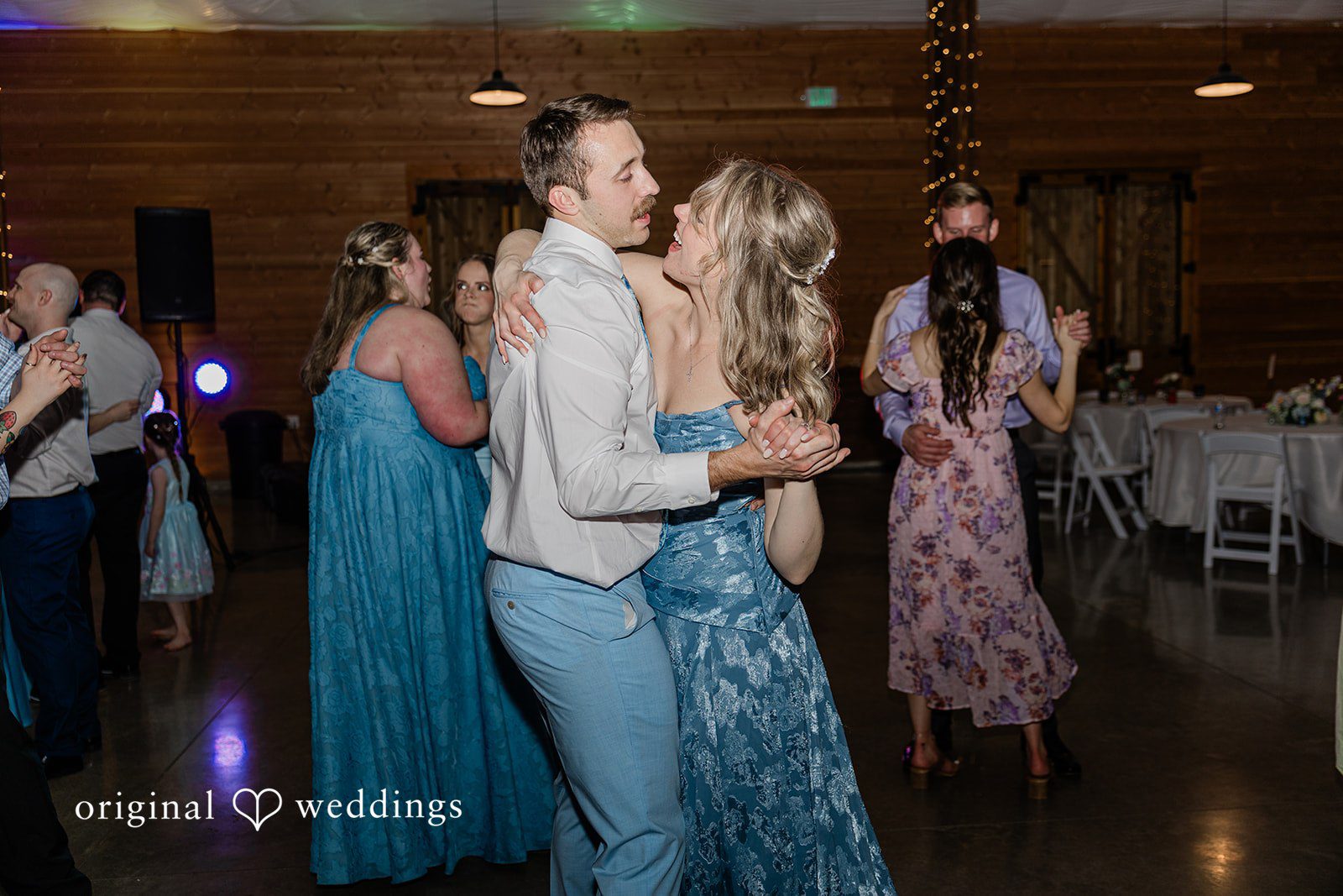 Aubrey + Casey Guests enjoy dancing together on the lively dance floor.