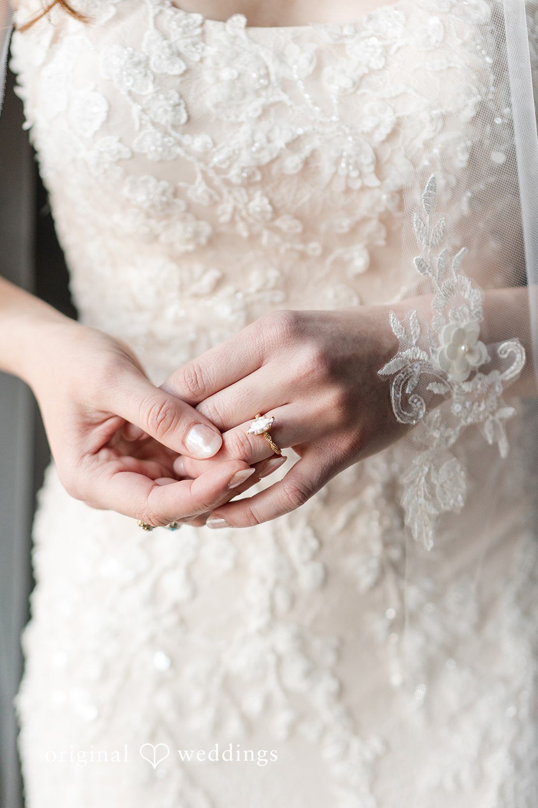 Kelsey + Jensen Romantic wedding detail highlighting bride’s ring at Edmonds Waterfront Center