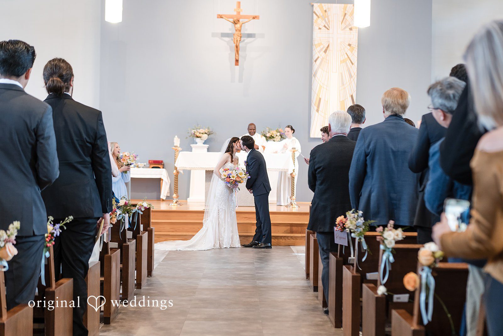 February 14, 2026 – Kelsey & Jensen – (ID-4399) Close-up of couple sharing a romantic kiss at Edmonds Waterfront Center