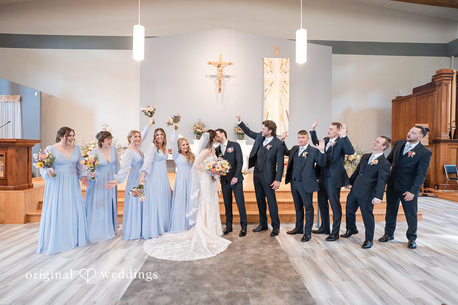 Kelsey + Jensen Close-up of couple kissing during ceremony at Edmonds Waterfront Center