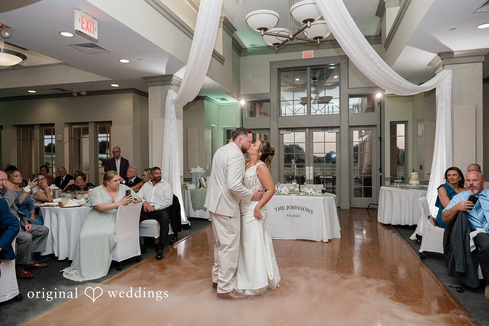Romantic kiss moment of the couple at dance floor