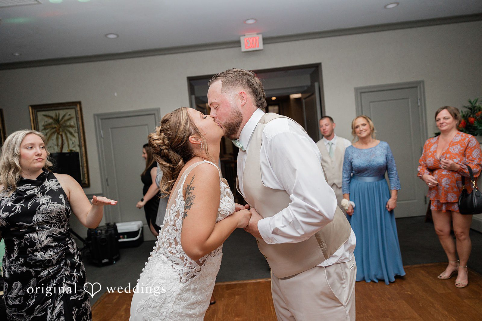 Romantic kiss moment of the couple at dance floor