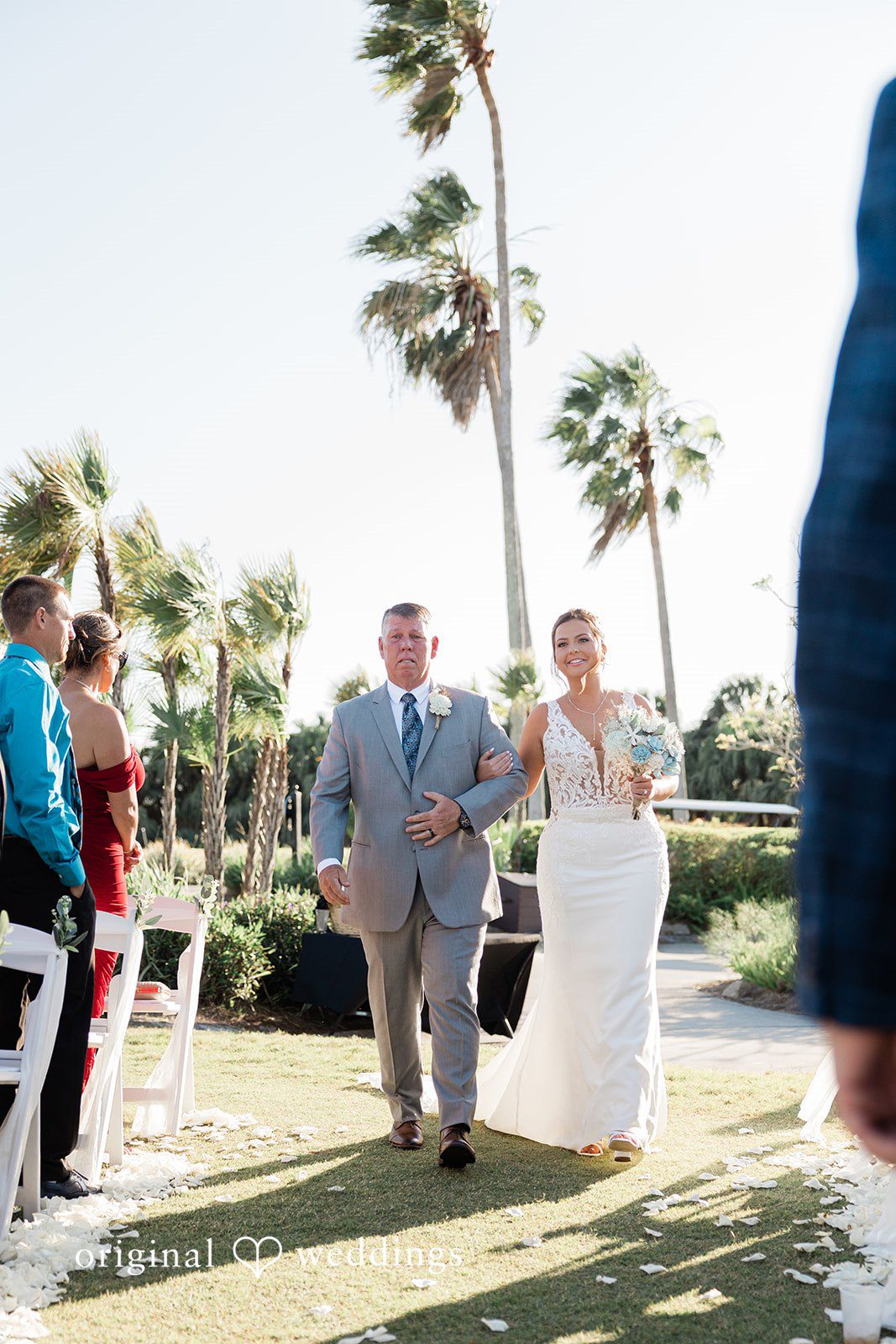 Lovely picture of bride walking hands in hands with her companion