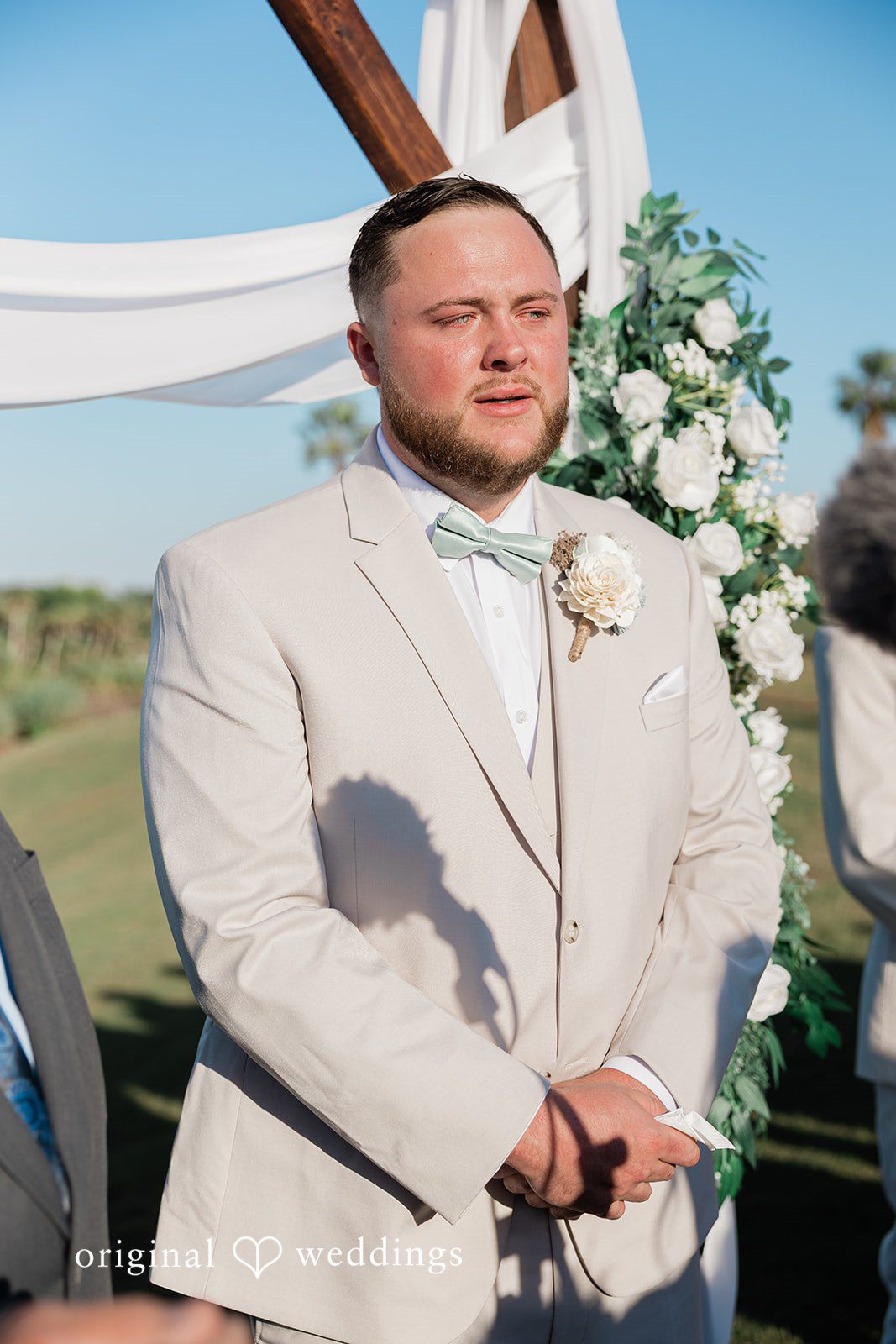 Groom waiting for his bride at Heron Creek Golf & Country Club
