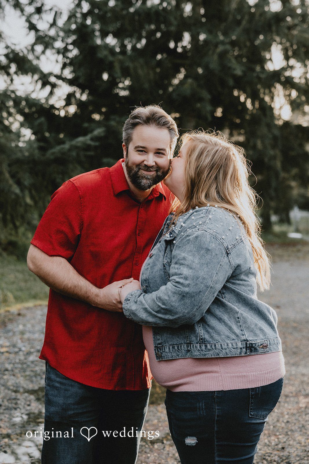 Romantic bride kissing groom at Hidden Farm & Stables