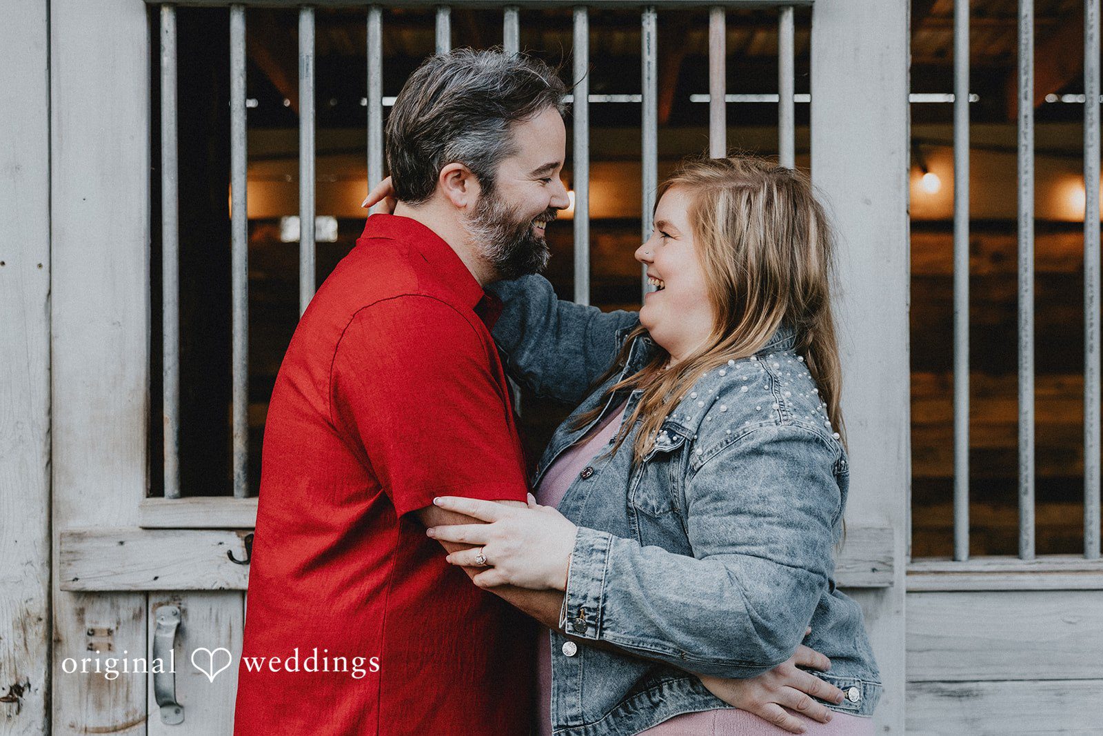 Beautiful smiling couple holding each other at Hidden Farm & Stables