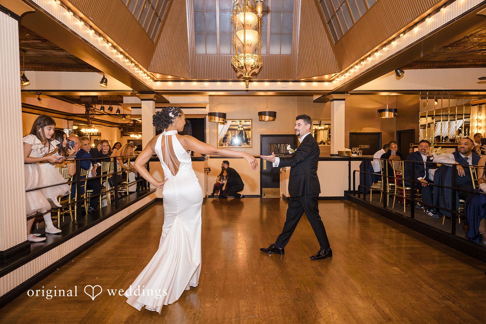 Patrick + Barbara Jean Groom laughing and celebrating with friends during the reception.