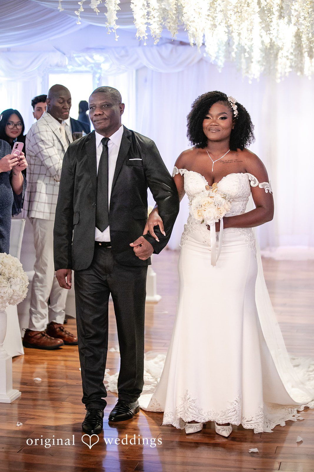 Whitchyna + Kevin Bride walking to the altar at Imperial Design