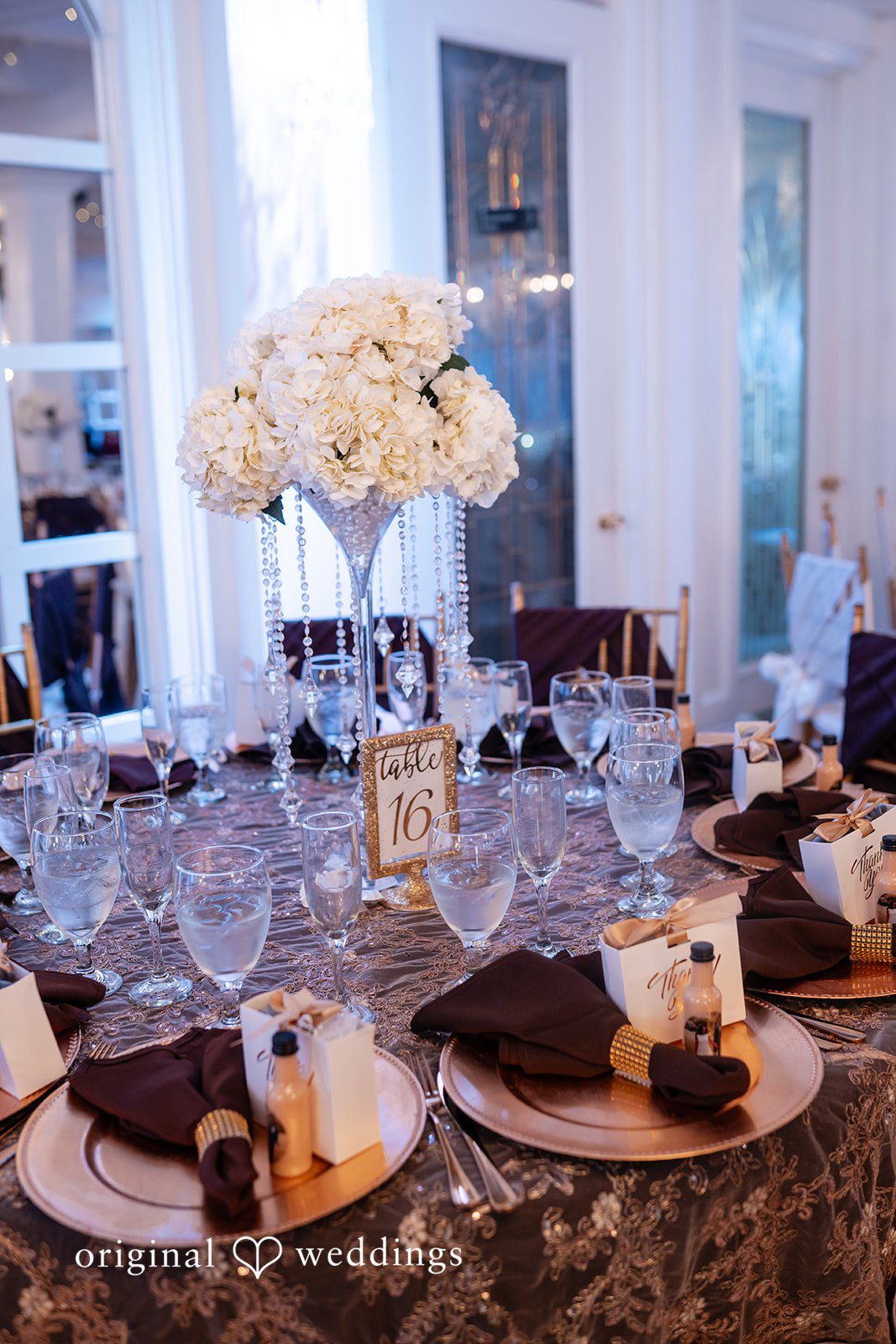 Whitchyna + Kevin Reception table decor arranged inside at Imperial Design