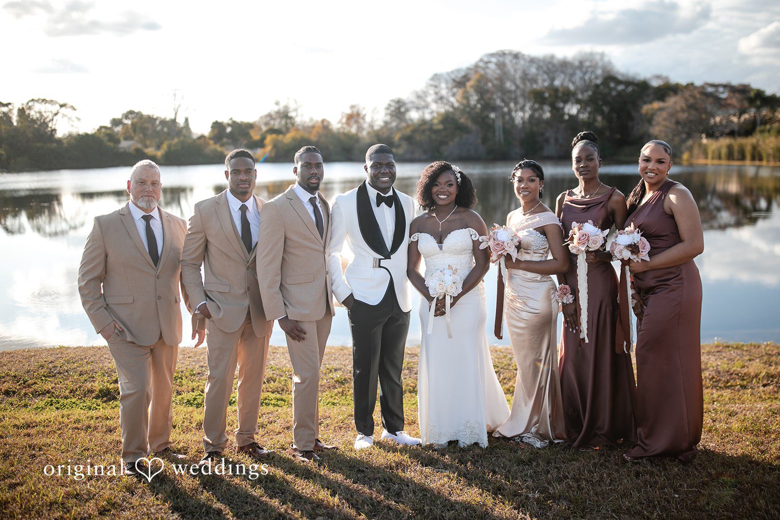 Whitchyna + Kevin Bride and groom posing with friends
