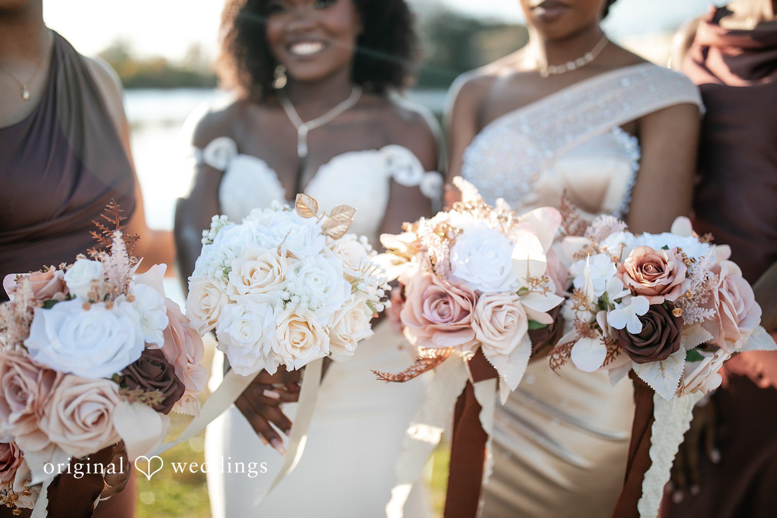 Whitchyna + Kevin Bride and bridesmaids holding beautiful floral bouquets at Imperial Design