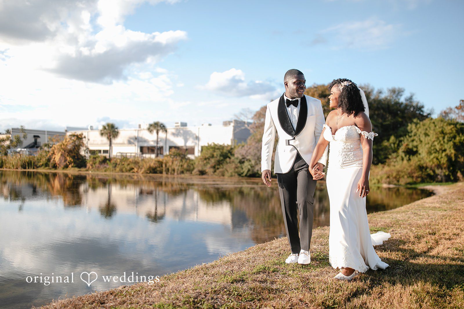 Whitchyna + Kevin Newlyweds enjoying a wedding moment at Imperial Design photographed by Orlando wedding photographers from Original Weddings
