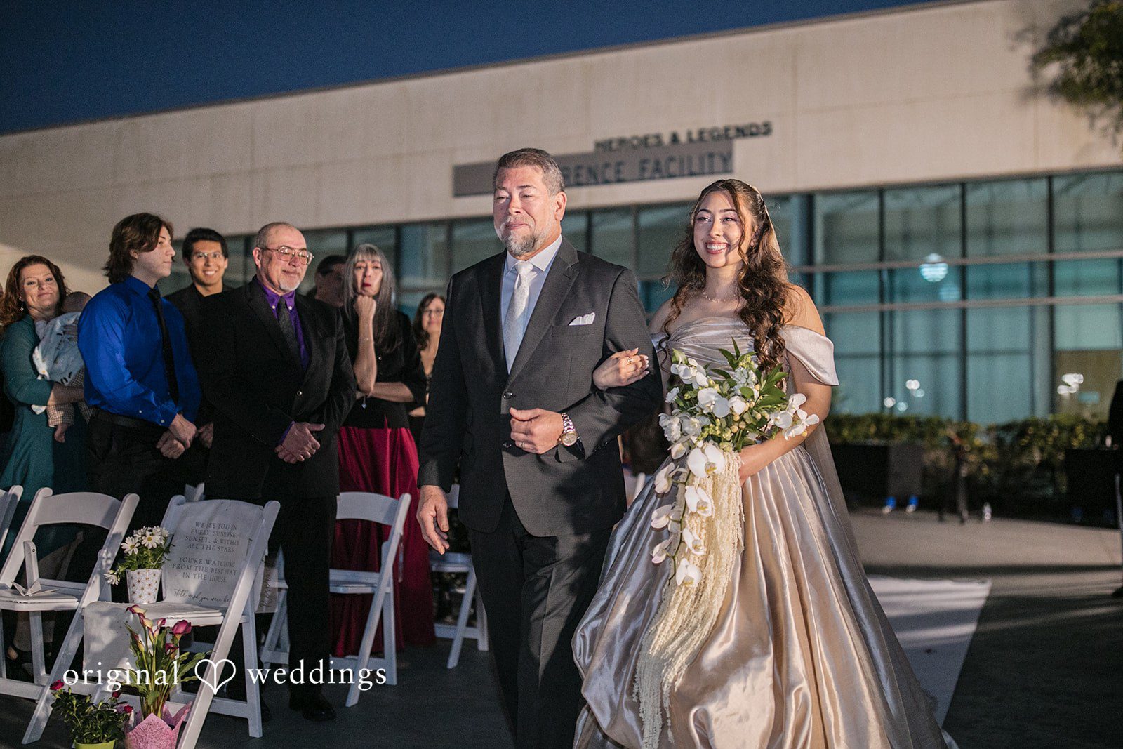 Bride walking to the altar at Kennedy Space Center