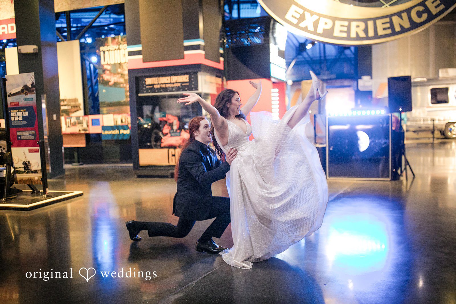 Romantic moment of groom carrying bride