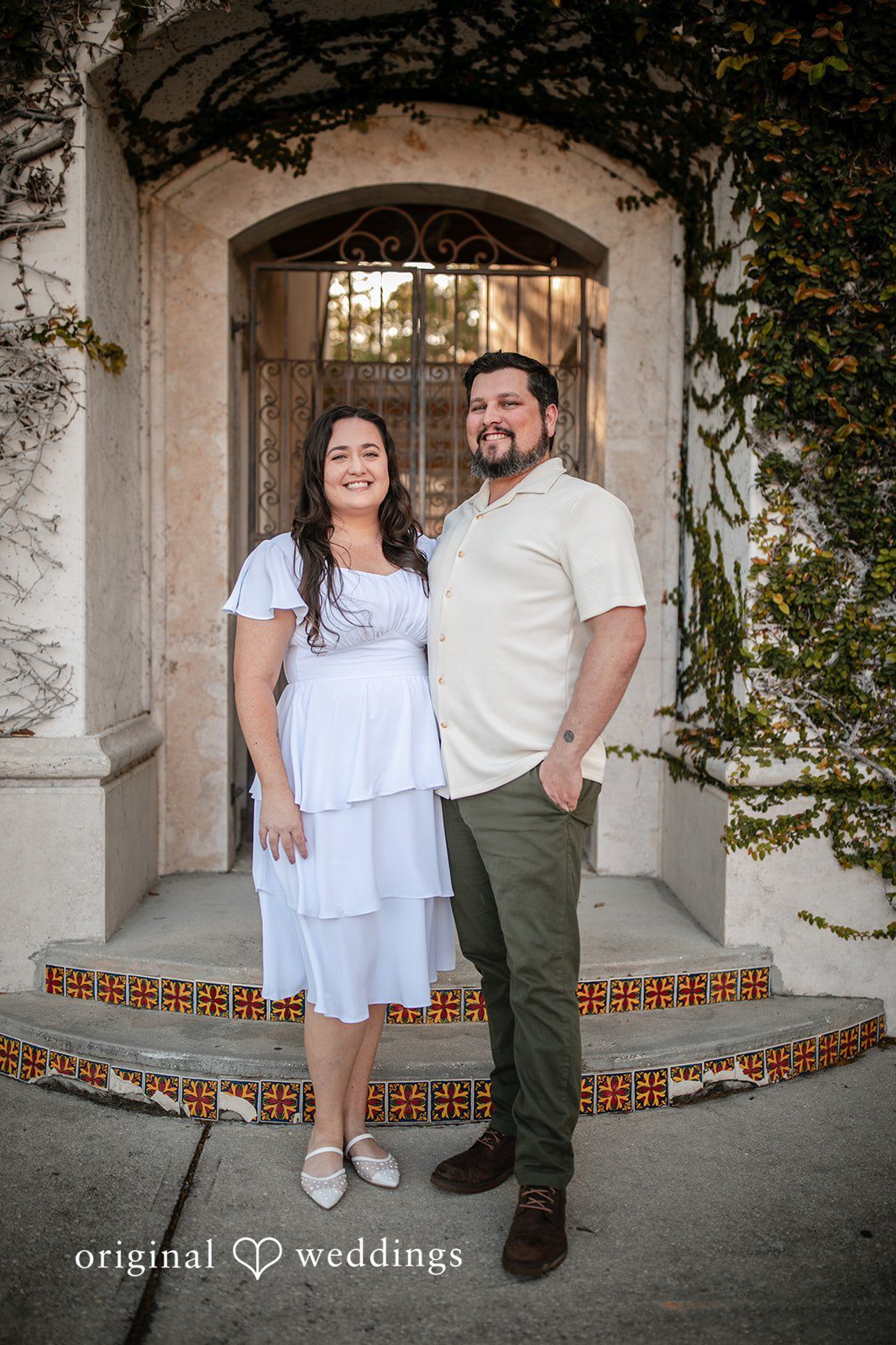 A beautiful portrait of the couple in front of the Kraft Azalea Gardens