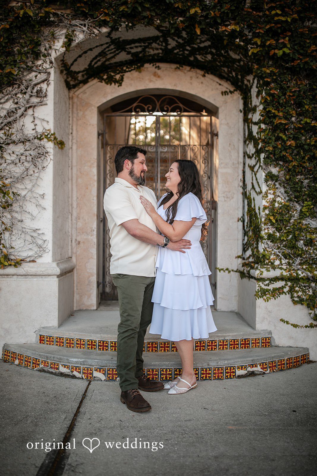 Our Orlando wedding photographers captured a romantic portrait of the couple in front of the Kraft Azalea Gardens