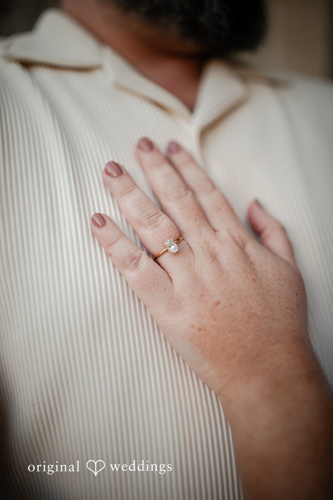 A close-up shot of the couple