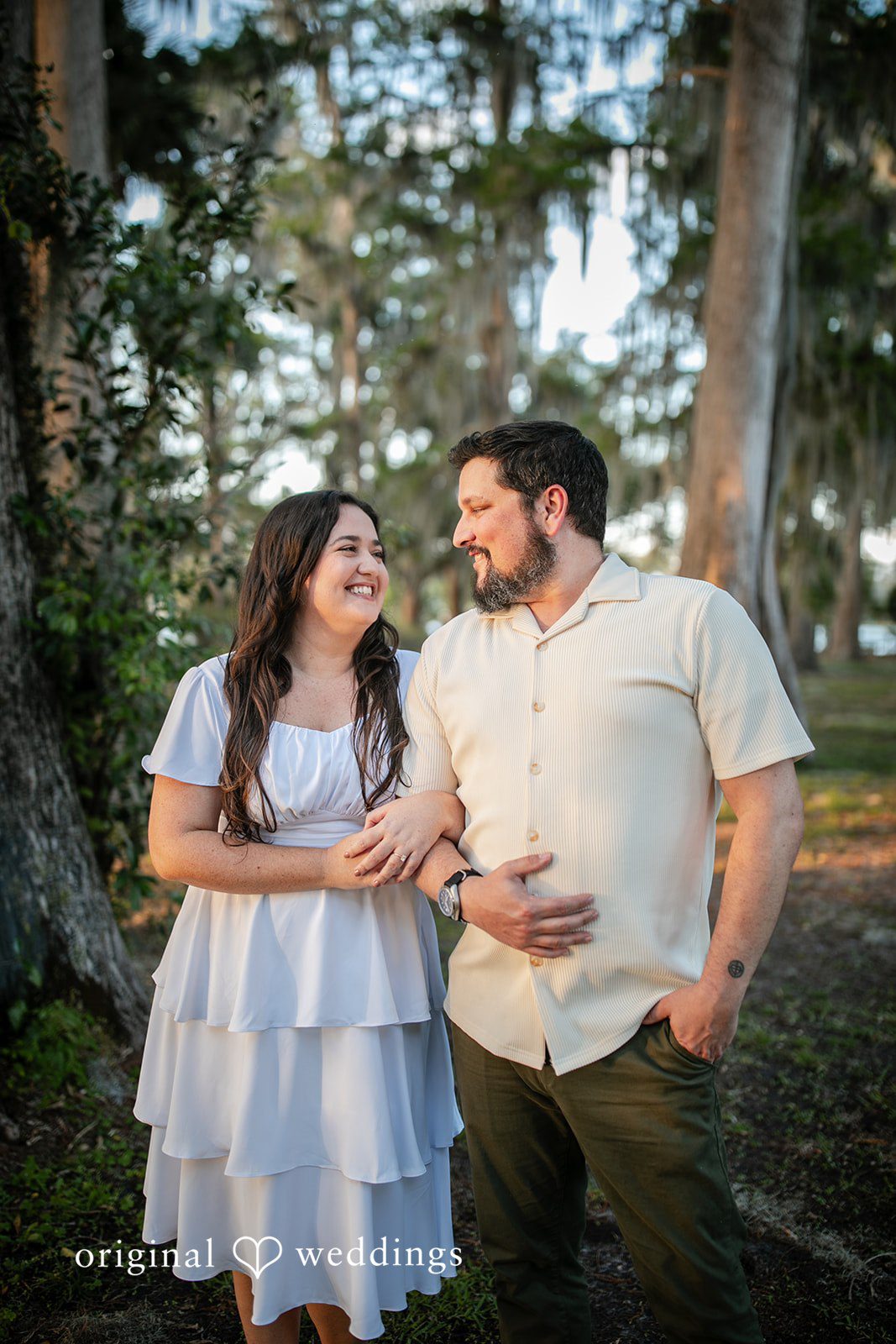 A romantic portrait of the couple at the garden