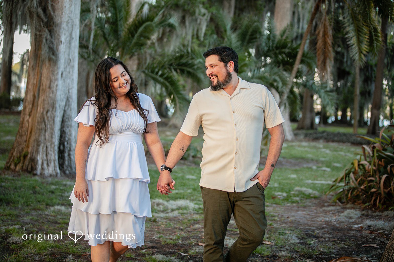 The couple takes a walk through the Kraft Azalea Gardens