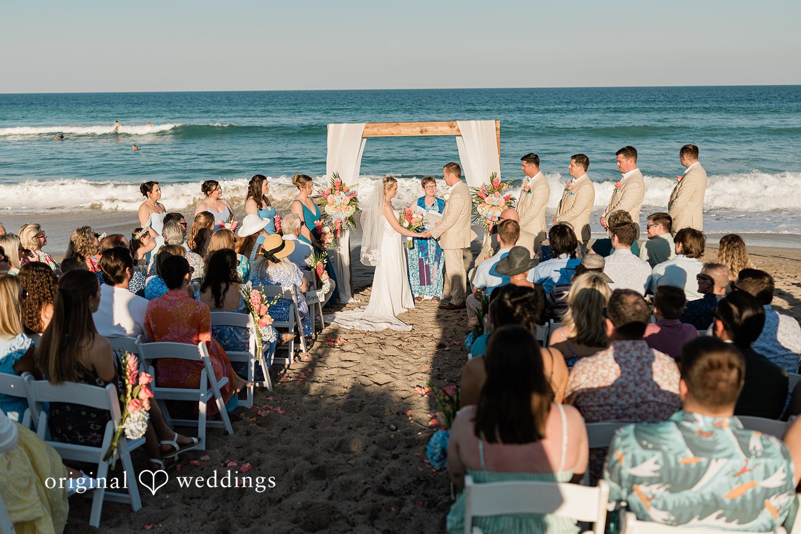 Ethan + Sydney Couple exchanging vows