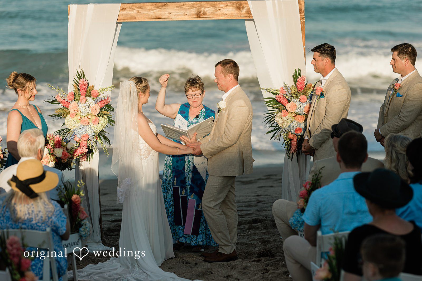 Ethan + Sydney The ceremony begins with the officiant speaking words to the couple at Marriott Hutchinson Island Beach Resort.
