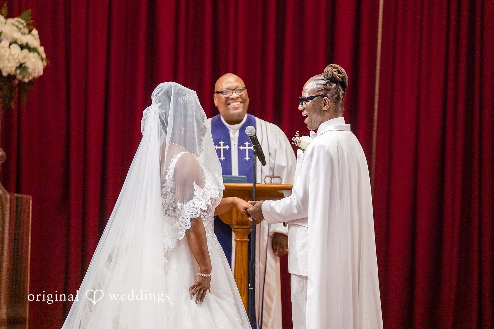Kimberly + Phillip The groom about to put a ring on the bride’s finger