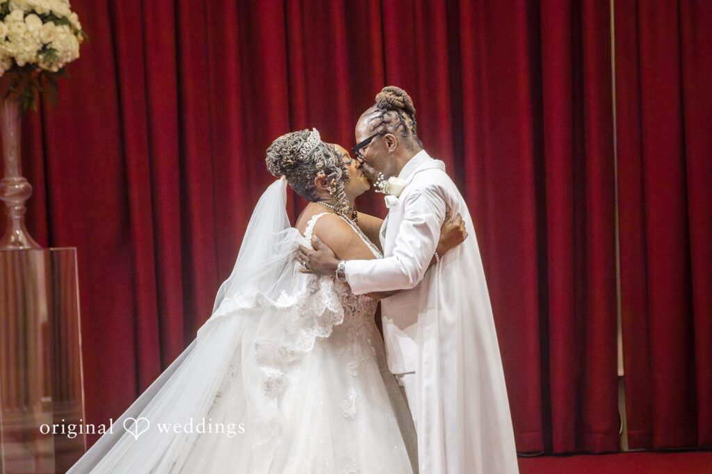Kimberly + Phillip Our Washington DC wedding photographer at Original Weddings captured the moment the couple shared their first kiss at the Memorial Chapel wedding ceremony