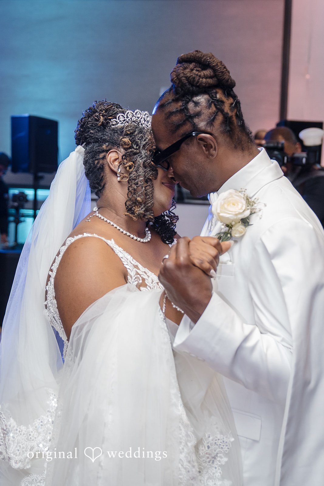 Kimberly + Phillip A romantic moment between the bride and groom at their wedding reception