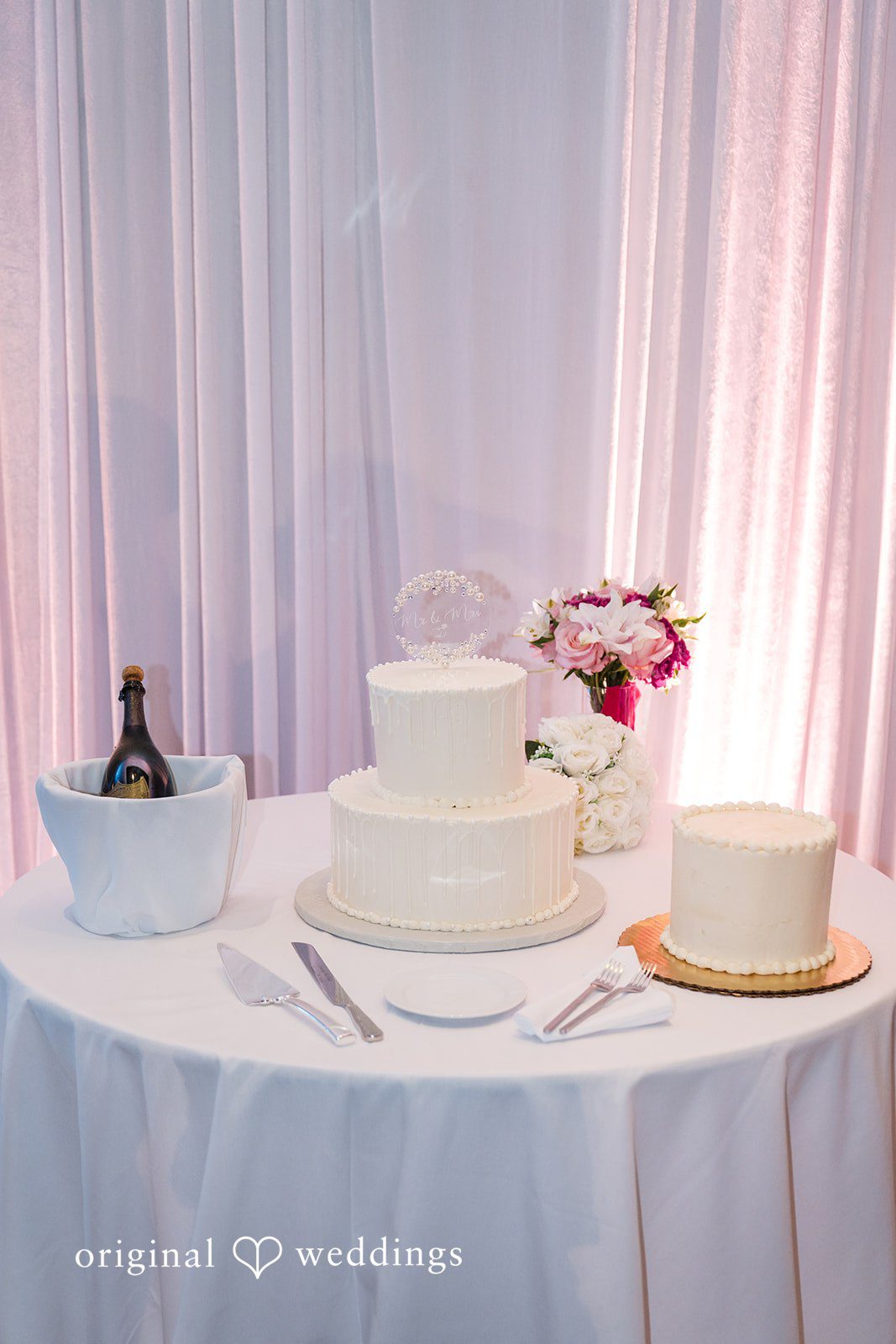 Kimberly + Phillip All-white wedding cakes at the wedding reception