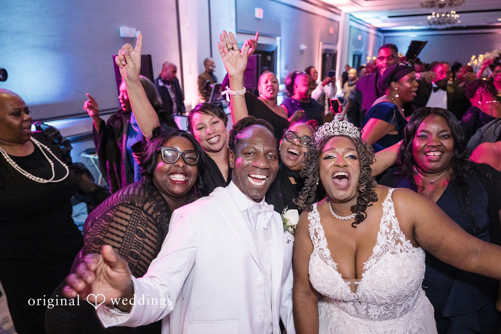 Kimberly + Phillip A joyful portrait of the couple and their wedding party