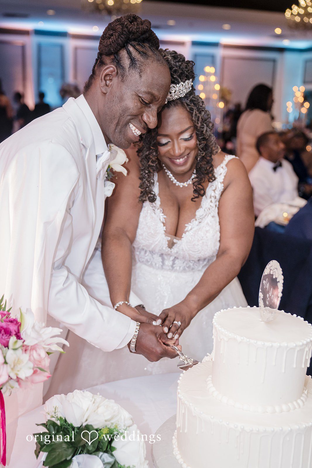 Kimberly + Phillip Our Washington DC wedding photographer captured the joyful moment the couple cut their wedding cake