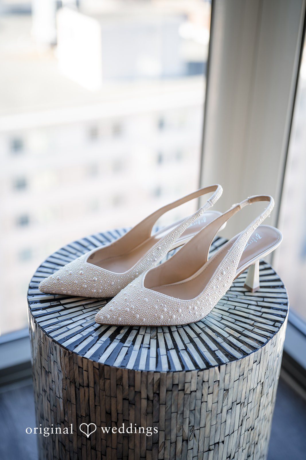 Kimberly + Phillip A detail shot of the bride’s wedding shoes