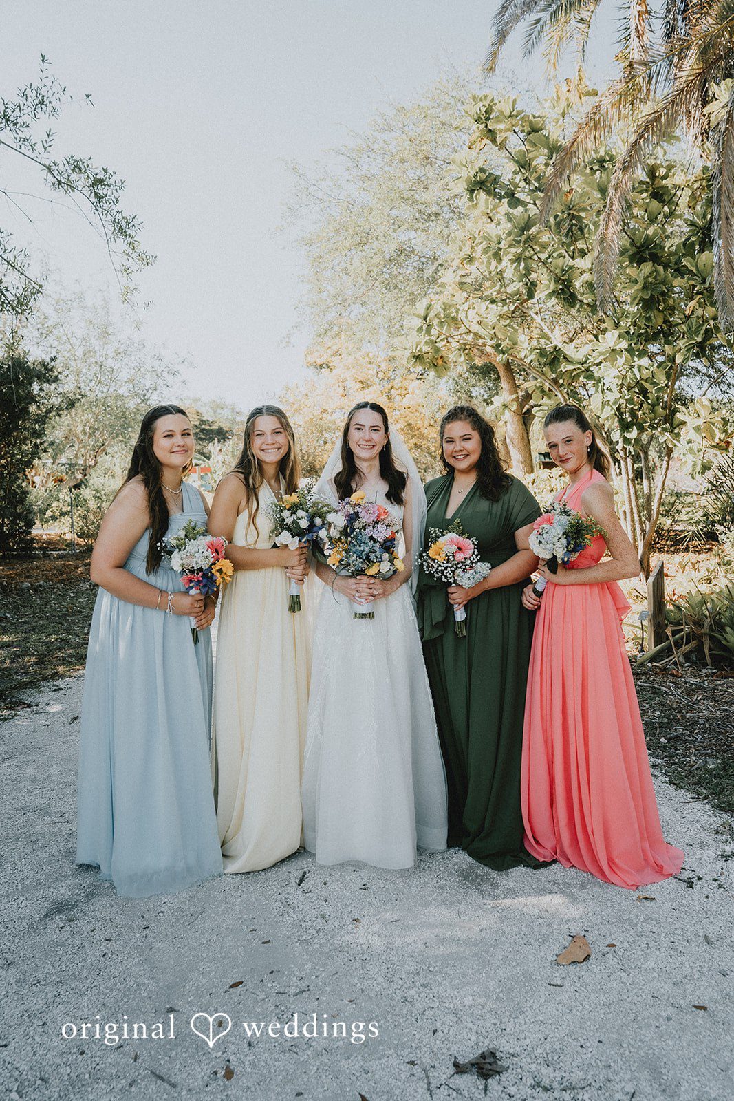 A beautiful portrait of the bride with her bridesmaids