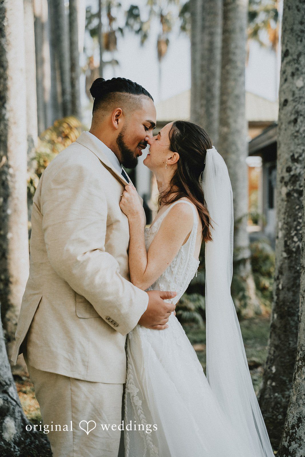 A romantic portrait of the couple at the garden