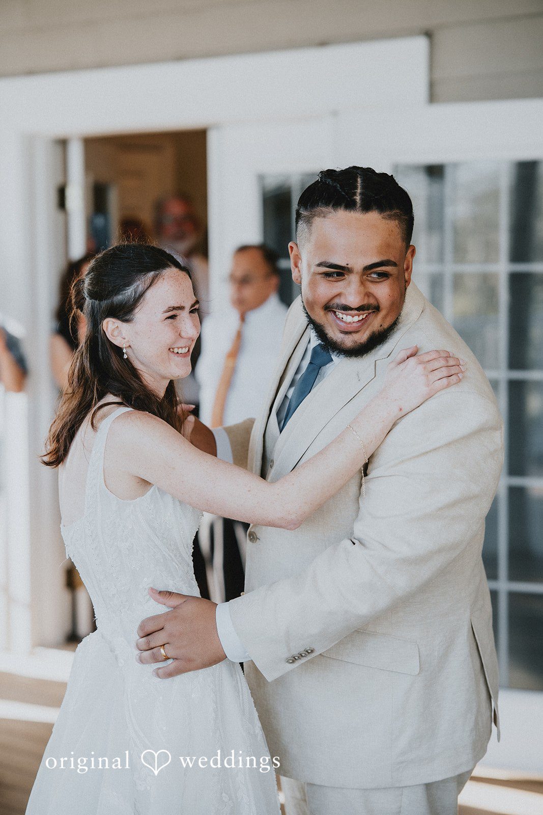 A joyful couple at their wedding reception