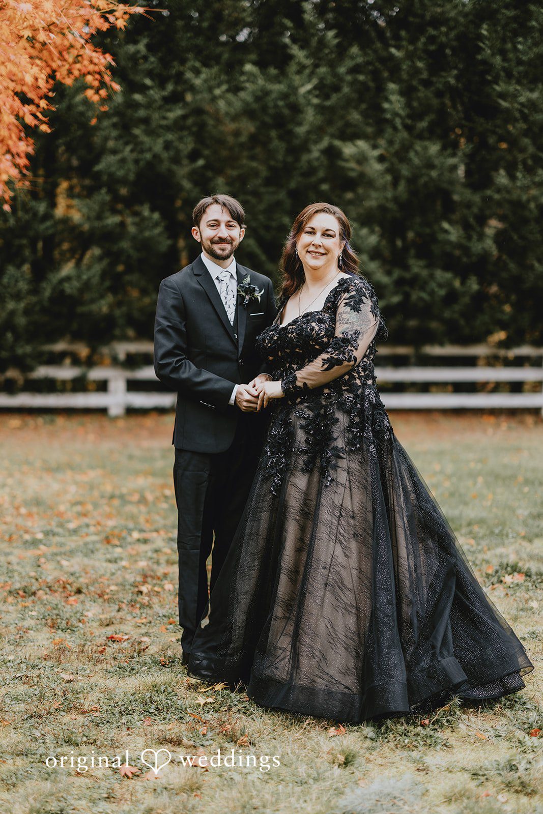 A bouquet held against a natural outdoor background highlights texture and color contrast.
