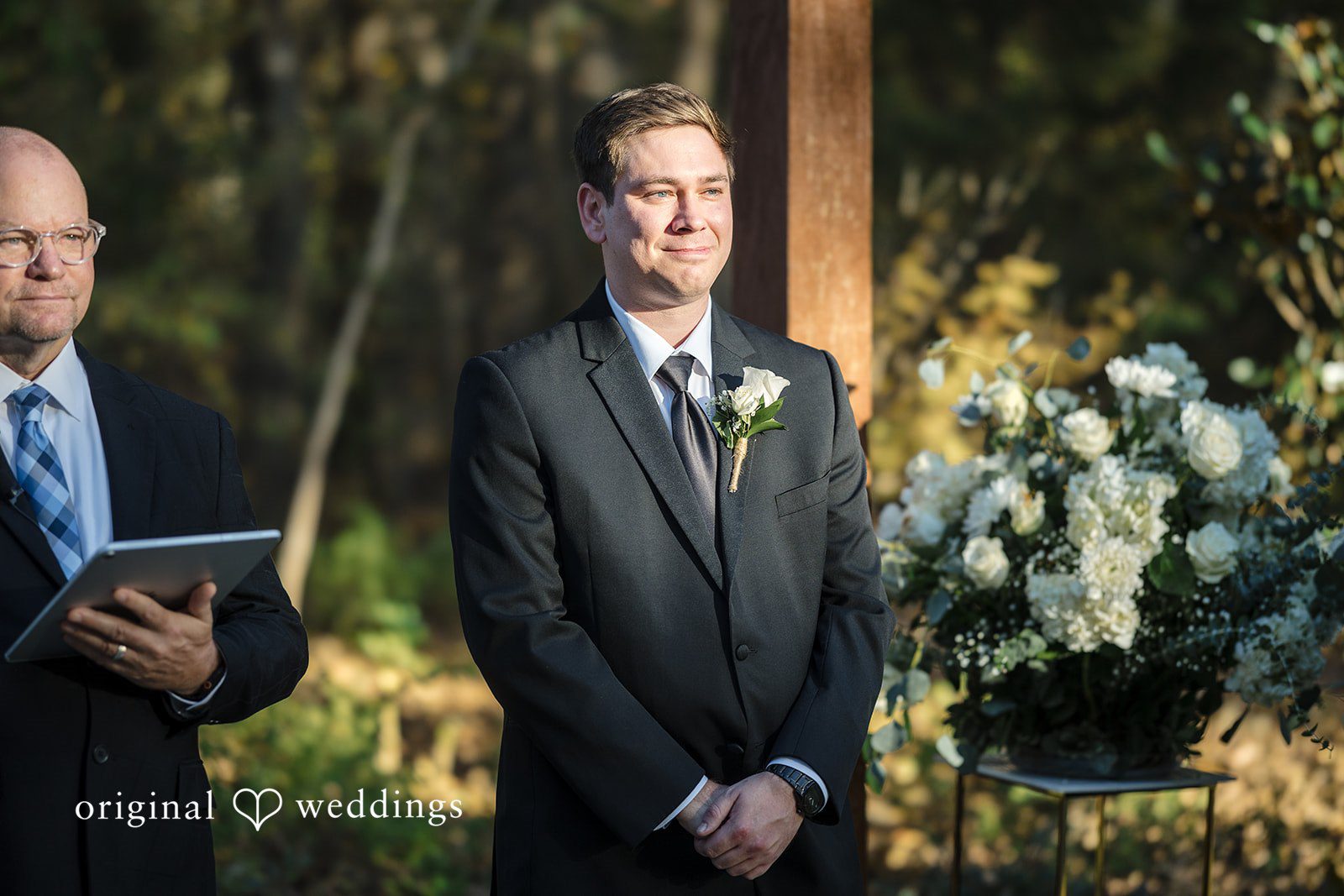 A portrait of the groom in anticipation of the bride