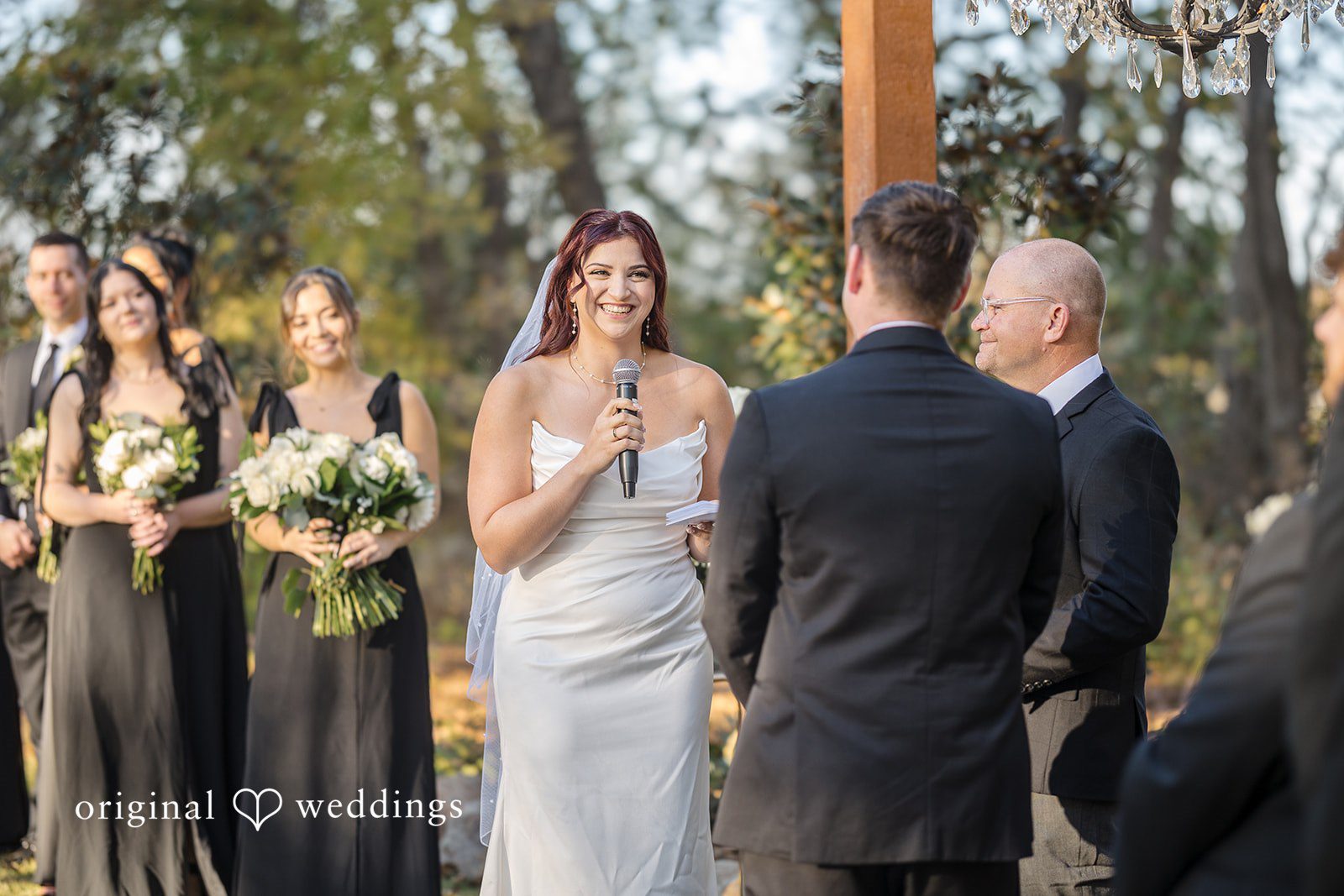 A joyful moment the bride reads her vows to the groom