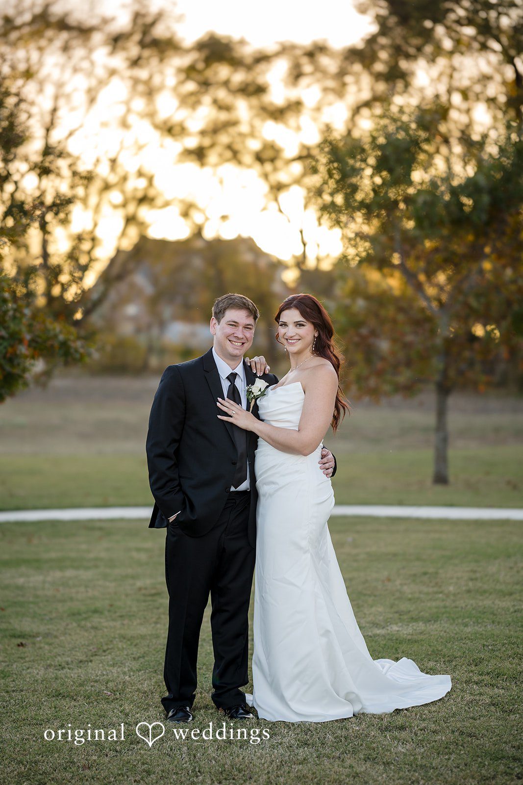 A stunning portrait of the couple in the outdoor area of their wedding venue